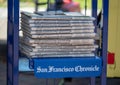 A stack of San Francisco Chronicle newspapers